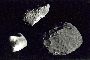 22kb - Image of an asteroid compared to Mars' two Moons